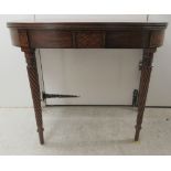 A Regency mahogany tea table, the foldover top raised on a rear gateleg action, on twist turned,