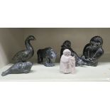 Six Inuit carved stone ornaments and figures: to include a seal and a wading bird  largest 5"h