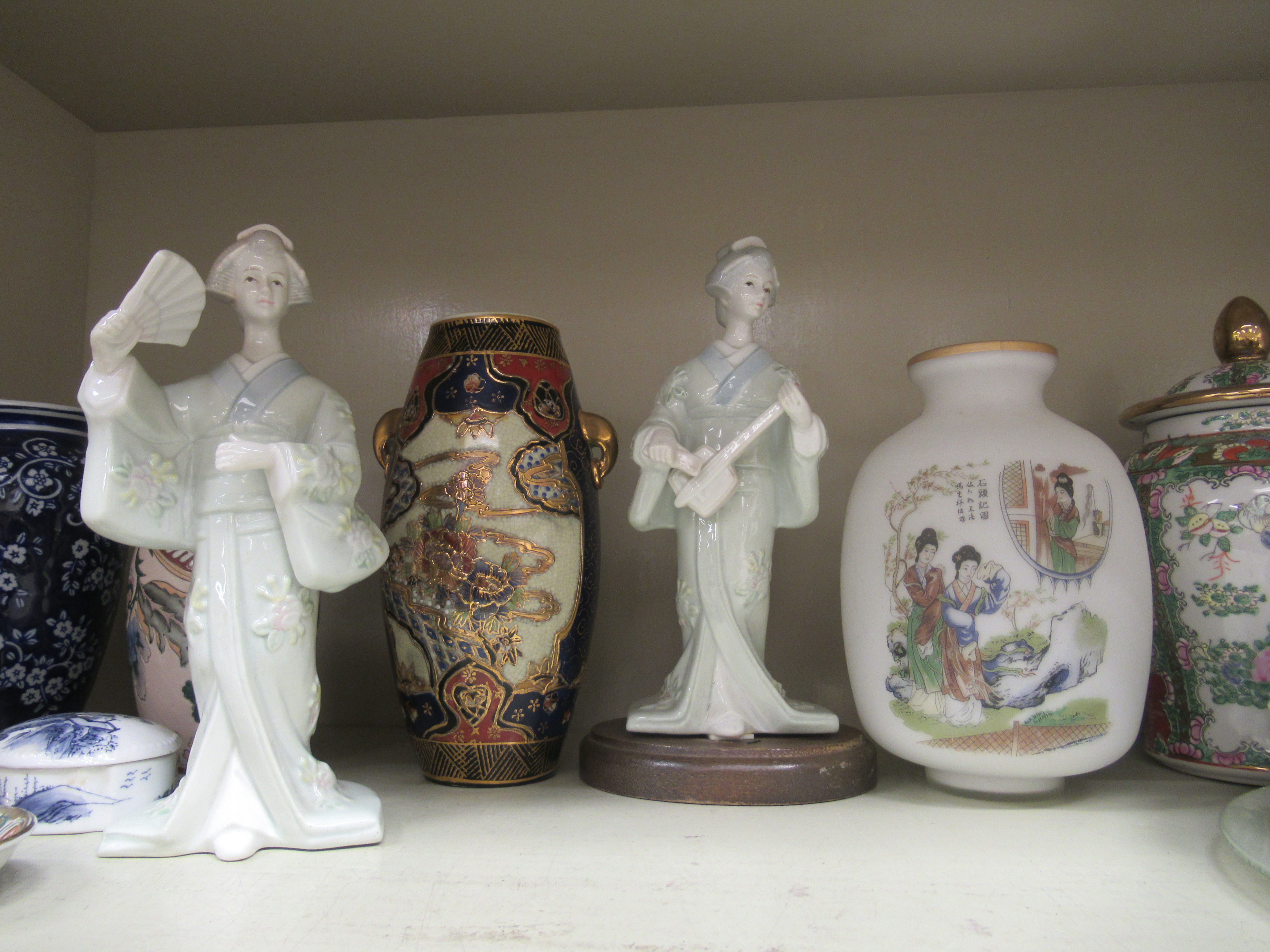 20thC Oriental ceramics: to include two covered vases  9" & 10"h; and a standing female figure, - Image 4 of 6