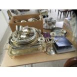 Silver plated tableware: to include coasters  4"dia; a twin branch candelabrum  10"h; and serving