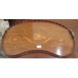 An Edwardian mahogany kidney shaped serving tray with inlaid musical and foliate ornament  14" x 27"