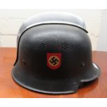 A replica German World War II military helmet