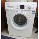 A Bosch Excell washing machine  33.5"h  23.5"w