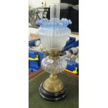 A mid 20thC Victorian style brass and glass oil lamp, on a stepped circular plinth  16"h