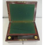 A mid/late 19thC flame mahogany writing slope with straight sides and a hinged lid, enclosing a