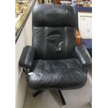 A modern Soderberg's black faux hide upholstered chair, raised on a metal, swivel base