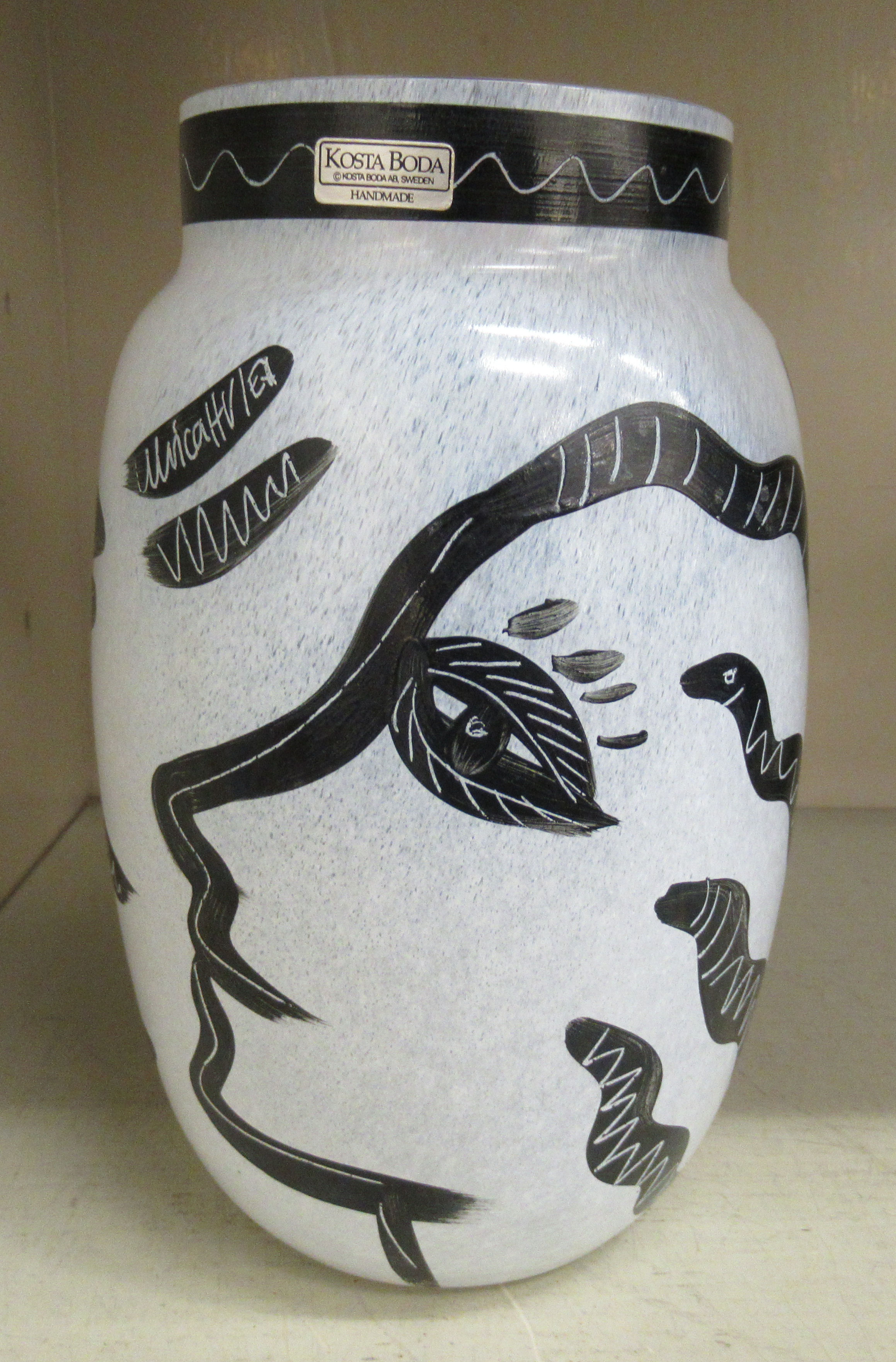 A Kosta Boda Caramba glass vase of baluster form, designed by Ulrica Hydman-Vallien, decorated in