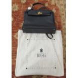 A designer handbag, bears Hermes, Paris stamps