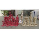 A late 19th/early 20thC carved and turned beetlenut stained and naturally coloured bone chess set