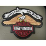 A modern painted cast metal sign 'Harley Davidson'  9.5"h  12.5"w