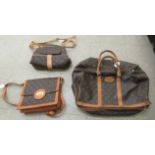 Three designer bags, each in the style of Louis Vuitton