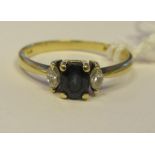 An 18ct gold sapphire and diamond set ring