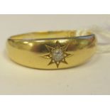 An 18ct gold single stone gypsy ring