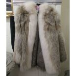 A wolf fur three quarter length jacket, trimmed with silver fox fur approx. size 10