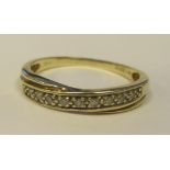 A 9ct gold crossover half eternity ring