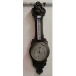 A 1920s/1930s stained oak and beech framed barometer  36"h