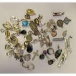 Costume jewellery: to include a silver coloured metal pendant cross; and various earrings