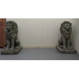 A pair of composition stone, seated heraldic lions, on square plinths  35"h