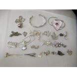 Silver coloured metal items of personal ornament: to include pendants and necklaces