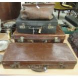 Three early 20thC stitched brown hide and other suitcases  largest 9"h  26"w; and a contemporary