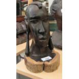 A carved wooden bust  11"h