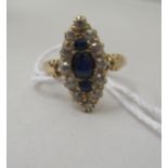 A gold coloured metal diamond and sapphire ring  boxed
