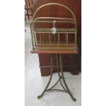 A late Victorian brass and oak music stand, raised on splayed legs  32"h  18"w