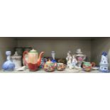 Decorative ceramics: to include a pair of modern European porcelain twin handled lidded pedestal urn