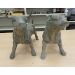 A pair of 20thC cast brass model standing bulls  10"h