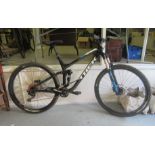 A Trek Fuel EX5 29er mountain bike with a 19.5" frame, Shimano hydraulic disc brakes, Shimano