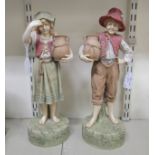 Two Robinson & Leadbeater porcelain figures, a young brother and sister, wearing period costume,