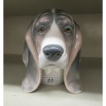 A Lladro porcelain model, a dog  5"h