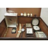 20thC wristwatches and travel timepieces: to include a mid 20thC stitched brown hide tavel case