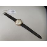 A Smiths Astral (circa 1970s) 9ct gold cased, waterproof wristwatch, faced by a baton dial with a