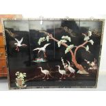 A series of four black lacquered panels, each decorated in relief in Japanese taste  36"h  12"w
