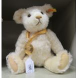 A Limited Edition Millenium Teddy bear made for Danbury Mint by Steiff with mobile limbs, wearing