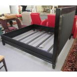A Ralph Lauren bed frame from the Brook Street range, the stud upholstered panelled headboard  82"w