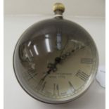 A modern brass and cast glass desk top timepiece, faced by a Roman dial  2.5"dia