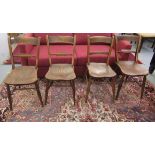 A set of four late 19th/early 20thC beech and elm framed bar back dining chairs, the solid seats