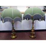 A pair of modern lacquered brass table lamps of knopped vase design, each with a matching domed