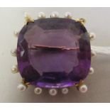 An 18ct gold amethyst and seed pearl set brooch (one pearl now missing)