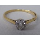 An 18ct gold diamond solitaire ring