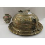Middle Eastern/Asian metalware: to include a food container with a hinged, domed lid, decorated with