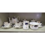 Bistro china teaware  comprising a teapot, sugar basin, cream jug, six plates, six cups and five