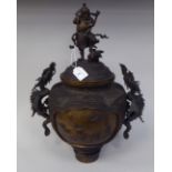 A late 19thC Japanese parcel gilt bronze bulbous, pedestal vase with opposing dragon handles, a