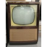 A mid 20thC Dynatron 18" television , in a mahogany finished cabinet with a speaker box base  37"h
