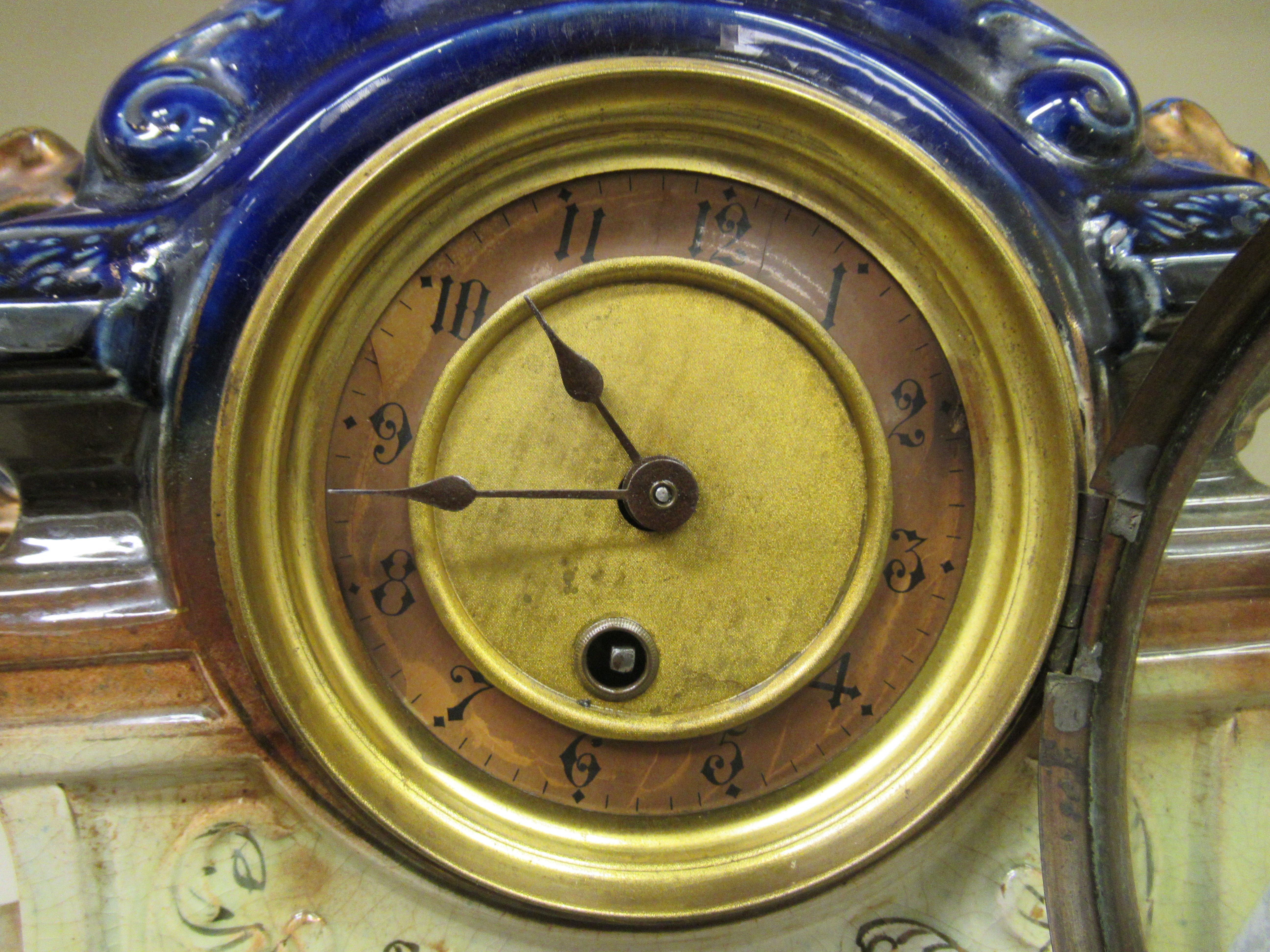 A late Victorian English china cased mantle clock; the movement faced by an Arabic dial, raised on - Image 2 of 8