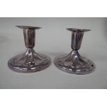 A pair of loaded Sterling silver dwarf candlesticks  stamped Sweden 925  3"h