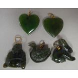 Five jade coloured pendants