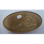 An 18ct gold single stone diamond set, oval equestrian brooch